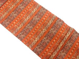 未使用品　横段に抽象動物模様織出し全通袋帯（未仕立て）